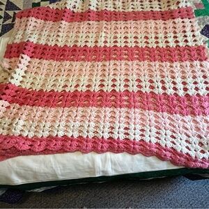 Beautiful handmade pinks and white afghan
